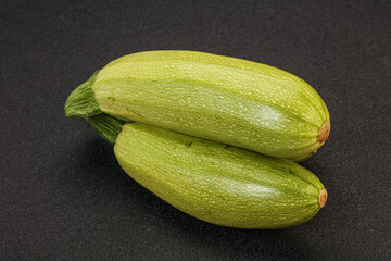 Young tasty zucchini over board