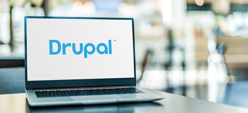 Laptop computer displaying logo of Drupal