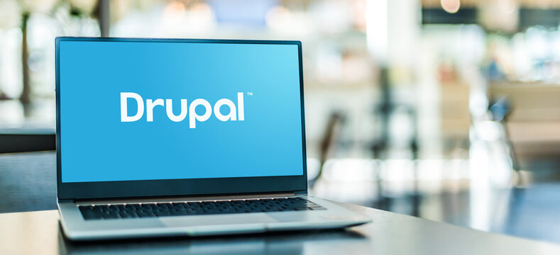 Laptop computer displaying logo of Drupal