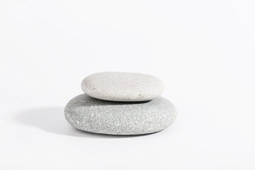 Empty grey stones podium on white color background.  Empty showcase for cosmetic product presentation. Fashion magazine.