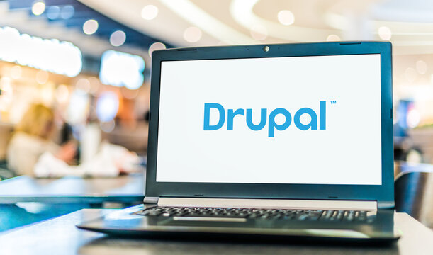 Laptop computer displaying logo of Drupal