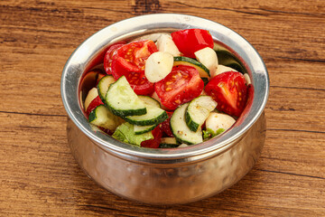 Salad with vegetables and mozzarlla