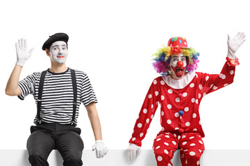 Funny clown and a mime sitting on a panel and waving