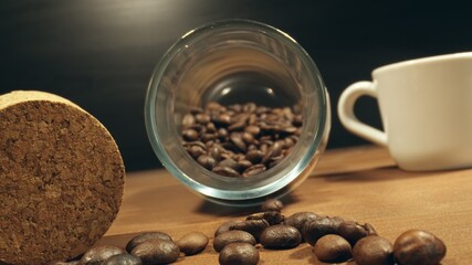 Roasted coffee beans on table in camera motion