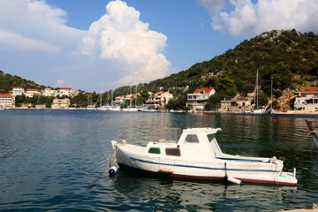 Obraz na płótnie Canvas Small fishing boat in the picturesque port on island Lastovo, Croatia.