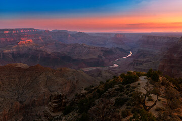 Scenic view of the Grand Canyon and the Colorado River from the Desert View viewpoint, in the Grand Canyon National Park, at sunrise, in the State of Arizona, USA