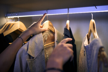 A business woman who choosing clothes for work. Business, hotel, people