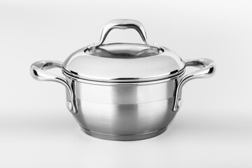 Stainless steel casserole on gray background