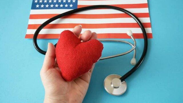 National american flag and heart. american heart month in February