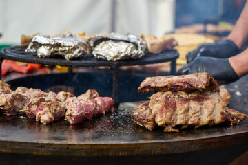 Cooking meat on fire. Traditional street food.