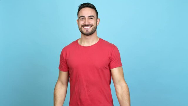 Caucasian handsome man keeping the arms crossed while smiling over isolated background