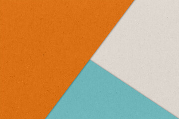 Kraft paper sheet overlap with orange, blue and gray colors for background