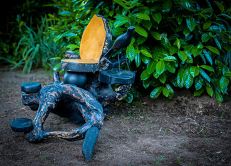 example of handicrafts made of rustic wood by a craftsman to effect the garden and outdoor areas. Sustainable craftsmanship with reusable wood