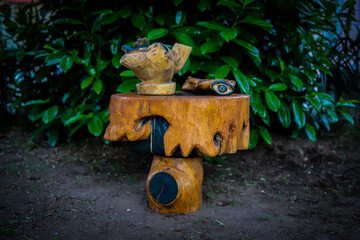 example of handicrafts made of rustic wood by a craftsman to effect the garden and outdoor areas. Sustainable craftsmanship with reusable wood