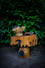 example of handicrafts made of rustic wood by a craftsman to effect the garden and outdoor areas. Sustainable craftsmanship with reusable wood