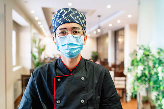 portrait of japanese chef expert in sushi