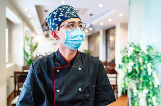 close-up of japanese chef expert in sushi