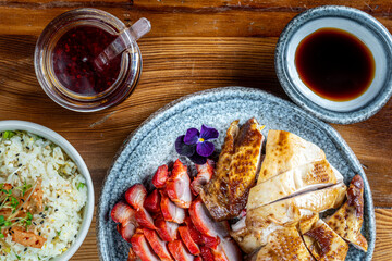 roast meat Asian style with rice and sauce