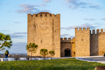 Fototapeta na wymiar Entrance to castle by sunset, Elvas, Portugal