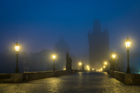 Empty Charles Bridge with mist at twilight, Prague, Bohemia, Czech Republic