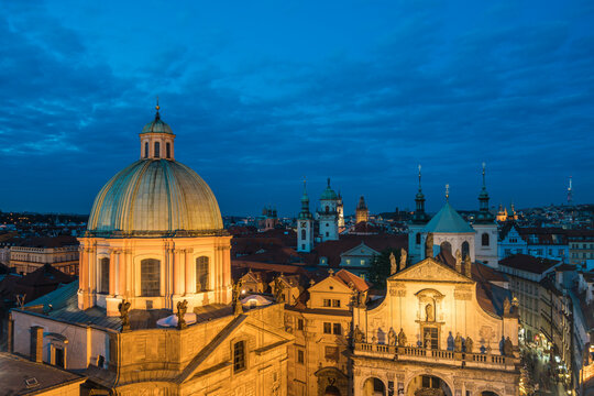 Dome of St. Francis Of Assisi Church against blue sky at twilight, Prague, Czech Republic