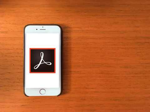 Adobe Acrobat logo editorial illustrative