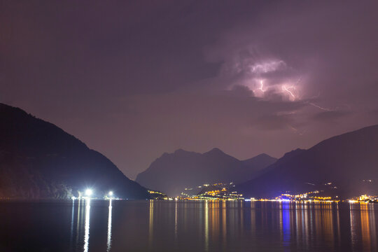 A lightning storm over lake Sulzano, Italy