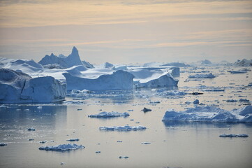 Greenland. Icebergs. Giant floating Iceberg from melting glacier. Global Warming and Climate Change. - obrazy, fototapety, plakaty