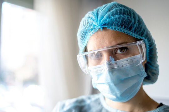 Medical Surgical Doctor and Health Care, Portrait of Surgeon Doctor in PPE Equipment on Isolated Background. Medicine Female Doctors Wearing Face Mask and Cap for Patients Surgery Work. Medic