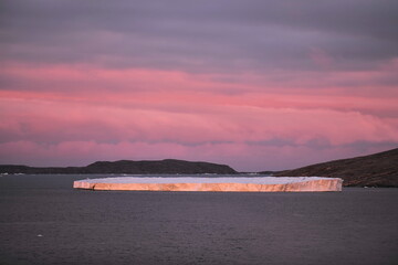 Greenland. Icebergs. Giant floating Iceberg from melting glacier. Global Warming and Climate Change.