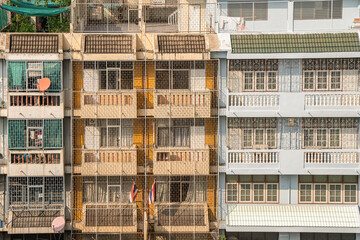 Wrought iron floor to ceiling grill on traditional building in Thai capital Bangkok