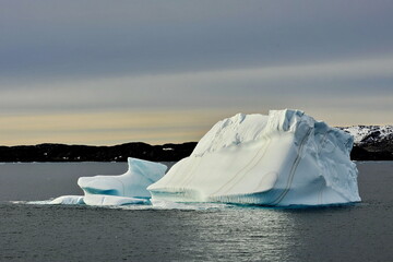 Greenland. Icebergs. Giant floating Iceberg from melting glacier. Global Warming and Climate Change.