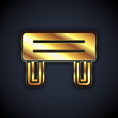 Gold Sauna wood bench icon isolated on black background. Vector.