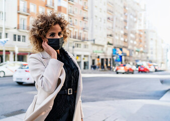 portrait of afro hair woman with mask