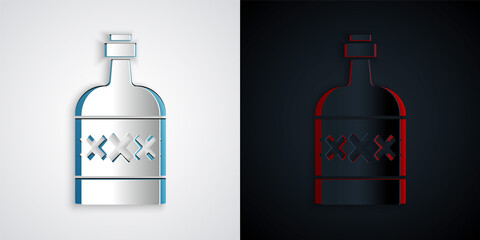 Paper cut Tequila bottle icon isolated on grey and black background. Mexican alcohol drink. Paper art style. Vector.