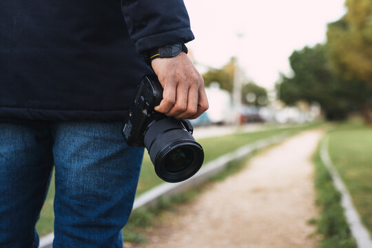 Close-up Of A Hand Holding A Photo Camera