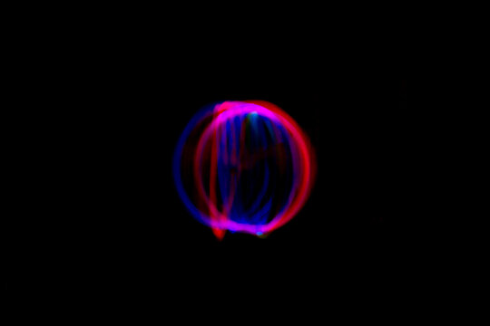 Red And Blue Orb On Black