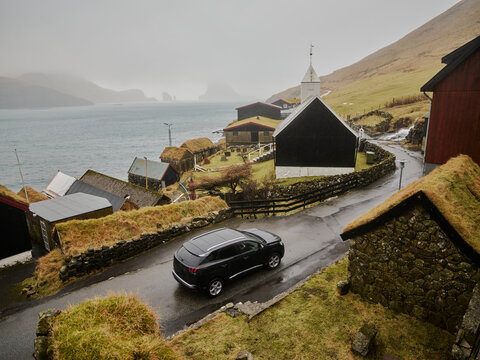 Driving through town of B&oslash;ur in the Faroe Islands