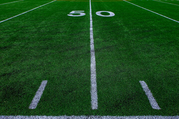 Fototapeta na wymiar Football Field Green Yard Markers to Goal Line Touchdown Endzone Game Competition