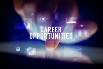 Finger touching tablet with charts and CAREER OPPORTUNITIES inscription, business concept
