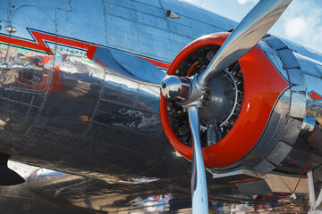 Close up view of a vintage propeller passenger and cargo airplane