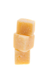 Aged cheese cubes isolated