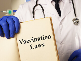 Vaccination Laws are shown on the conceptual photo using the text