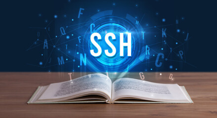 SSH inscription coming out from an open book, digital technology concept