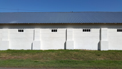 Fototapeta na wymiar Agricultural building. Barn. Building in the countryside