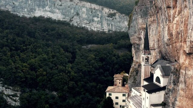 Aerial view over secret church in the mountains.