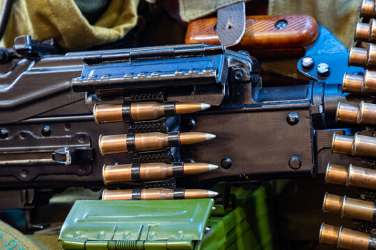 Machine-gun belt with equipment on a soldier during the war. Military action in the world.