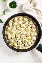 Swedish meatballs with white creamy sauce