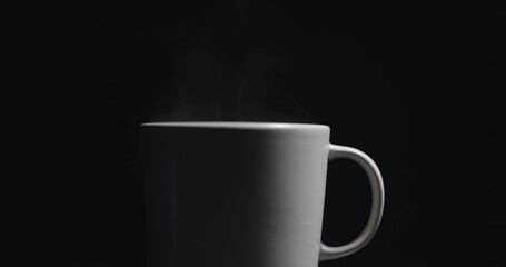 Vapor rising from hot mug closeup footage