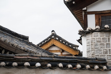 Fototapeta na wymiar Bukchon Hanok Village, a Korean traditional village with view of Namsan Tower in Seoul, South Korea.